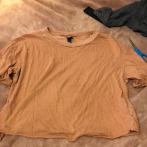 Orange, cropped-tee, size medium but can fit a large